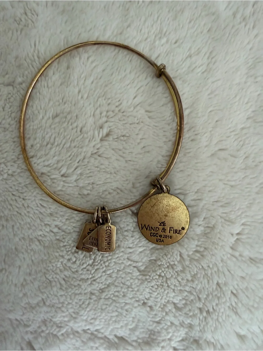Wind & Fire gold tone